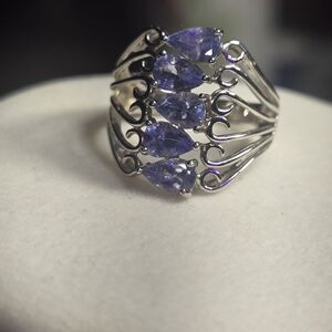 Elegant Silver and Purple Gemstone Ring